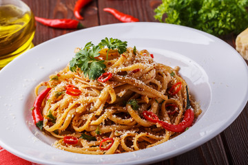Homemade linguine pasta in arrabbiata sauce.