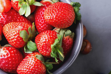 Strawberries and Blueberries on metal background