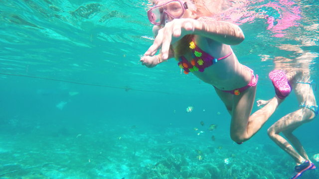 Young girl scuba diver
