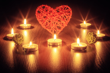 Red heart with candles.