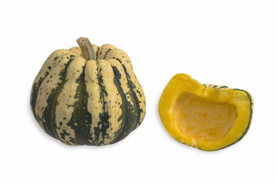 One Whole Small Sweet Dumpling Squash and One Halved Showing the Inside