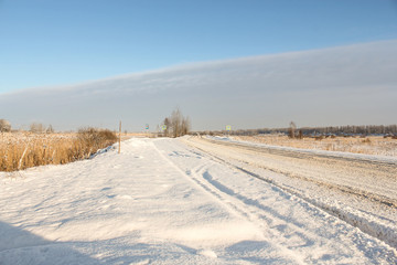 Fototapeta na wymiar Winter trail in the snow.