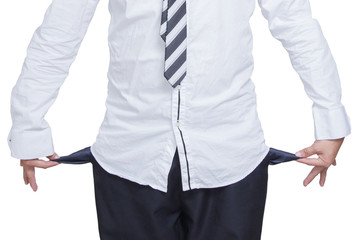 Business man showing his empty pockets on white