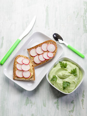 slice bread with radish moustard and avocado sauce