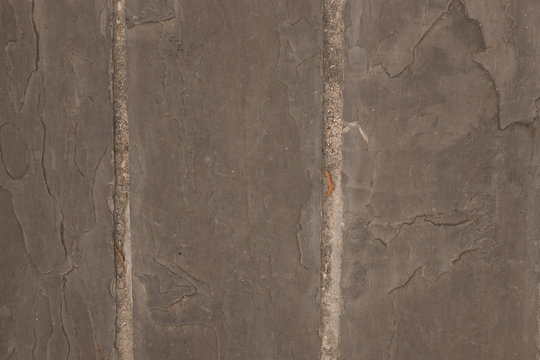 Light Grey Grunge Textured Of A Vertical Stone Wall