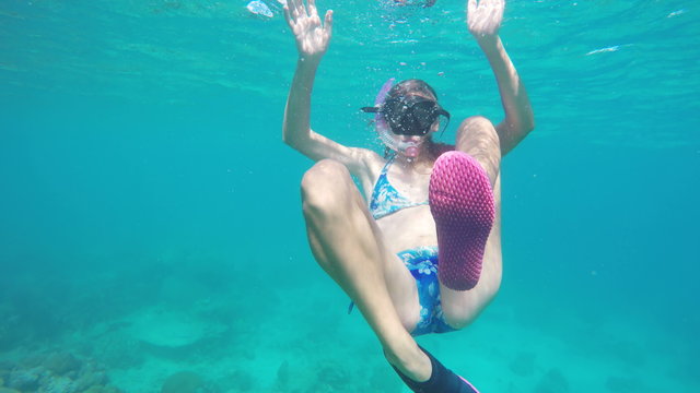 Young girl scuba diver
