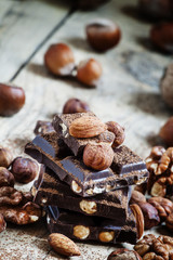 Dark chocolate with hazelnuts, walnuts, almonds, sprinkled with