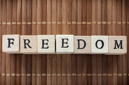 Freedom Word Written On Wooden Blocks