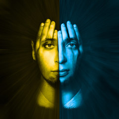 yellow - blue face visible through his hands. Double Exposure