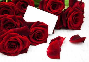 Red roses and greeting card
