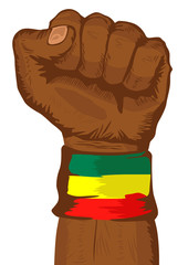 fist wearing a flag of Ethiopia wristband clenched tight