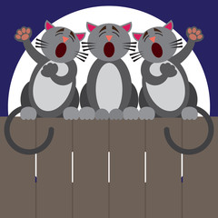 Three cats sitting on a fence at night putting on a performance