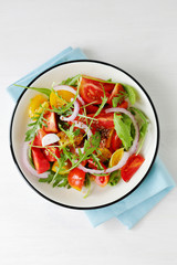 light tomato salad on plate