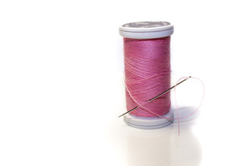 Needle in a spool of thread