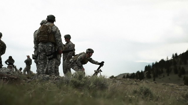 Soldiers setting up on mortar range for training and practice.