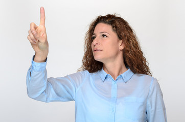 Attractive woman using a touch screen