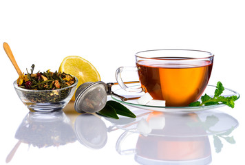 Tea Cup and Tea Ingredients on  White Background
