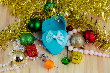 Heart with decoration on wood.