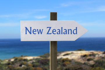 New Zealand sign with seashore in the background © chrupka