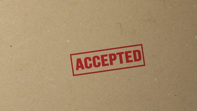 Accepted red ink stamp on documents folder