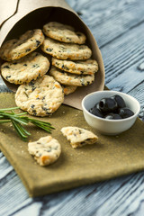 Cookies with cheese, olives and rosemary