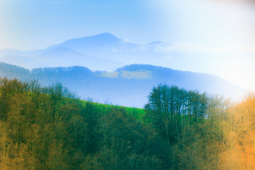 Landscape in the mountain:hazy tops and spring valleys.