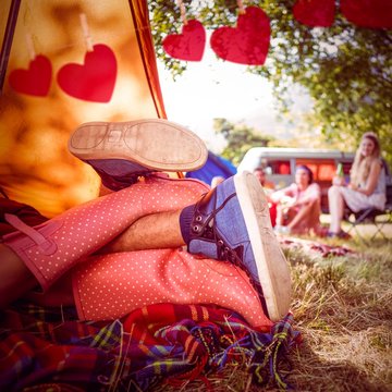 Composite Image Of Young Couple Making Out In Tent