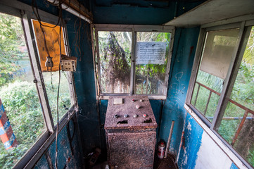 Operating booth for derelict roller coaster at abandoned amusement park in Yangon