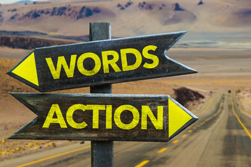 Words - Action signpost in a desert background