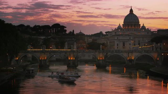 Slight left-to-right pan of Ponte Sant'Angelo and dome of St. Peter's Basilica