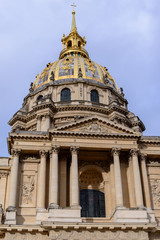 Golden dome of Les Invalides on background. Les Invalides - complex of museums and monuments, burial site for some of France's war heroes, notably Napoleon Bonaparte.