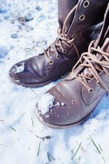 Brown boots in the snow