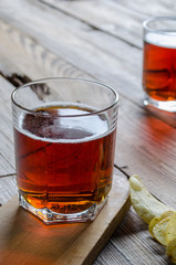 Two glass beer on wood background
