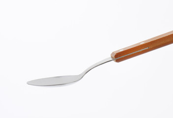 Wooden-handled spoon