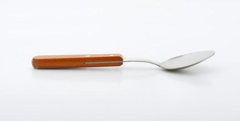 Wooden-handled spoon