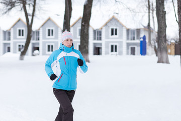 Young running or jogging caucasian woman