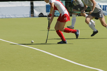 Obraz premium Women field hockey players with ball