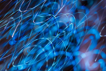 bright sparks on colorful background with bokeh effect