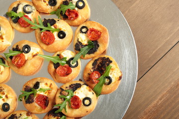 vegetable canapés on a silver tray

