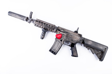 automatic carbine and red heart 