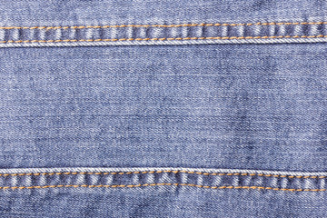 Blue jeans sew closeup texture.