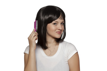 Fototapeta premium beautiful young woman posing with a short black wig