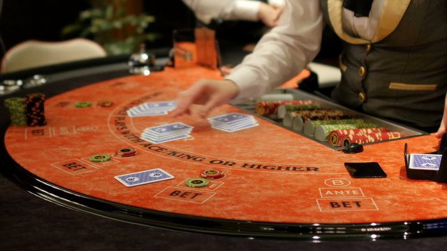 gamble players at casino, gambling roulette poker game table