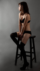 Seated Woman in Lingerie