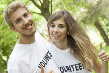 Fototapeta premium couple of teenagers volunteering