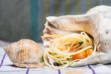 Italian spaghetti and clams in a large shell