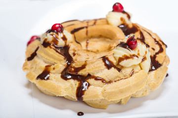 zeppola St. joseph with berries and caramel