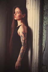 Beautiful young woman with tattoos,  retro stylization