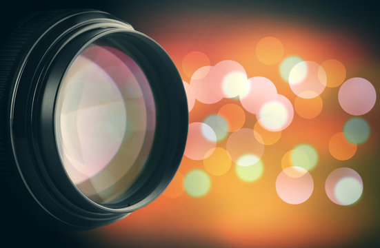 Lens of camera on abstract night background, close up