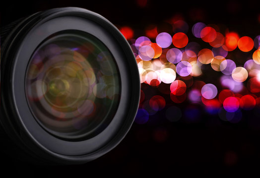 Lens Of Camera On Abstract Night Background, Close Up